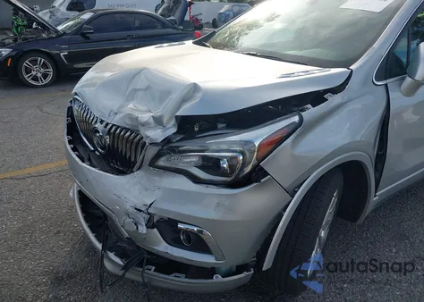 2017 Buick Envision Essence z USA, uszkodzony, nr VIN LRBFXBSA8HD004081